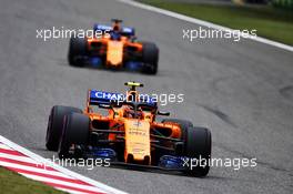 Stoffel Vandoorne (BEL) McLaren MCL33 leads team mate Fernando Alonso (ESP) McLaren MCL33. 14.04.2018. Formula 1 World Championship, Rd 3, Chinese Grand Prix, Shanghai, China, Qualifying Day.