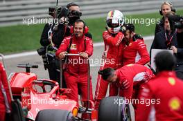 Sebastian Vettel (GER) Ferrari SF71H celebrates his pole position with the team in qualifying parc ferme. 14.04.2018. Formula 1 World Championship, Rd 3, Chinese Grand Prix, Shanghai, China, Qualifying Day.