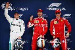 Qualifying top three in parc ferme (L to R): Valtteri Bottas (FIN) Mercedes AMG F1, third; Sebastian Vettel (GER) Ferrari, pole position; Kimi Raikkonen (FIN) Ferrari, second. 14.04.2018. Formula 1 World Championship, Rd 3, Chinese Grand Prix, Shanghai, China, Qualifying Day.
