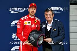 Sebastian Vettel (GER) Ferrari with his Pole position Award in qualifying parc ferme. 14.04.2018. Formula 1 World Championship, Rd 3, Chinese Grand Prix, Shanghai, China, Qualifying Day.