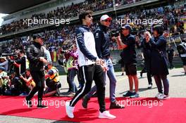 (L to R): Lance Stroll (CDN) Williams and Esteban Ocon (FRA) Sahara Force India F1 Team on the drivers parade. 15.04.2018. Formula 1 World Championship, Rd 3, Chinese Grand Prix, Shanghai, China, Race Day.