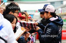 Sergio Perez (MEX) Sahara Force India F1 signs autographs for the fans. 12.04.2018. Formula 1 World Championship, Rd 3, Chinese Grand Prix, Shanghai, China, Preparation Day.