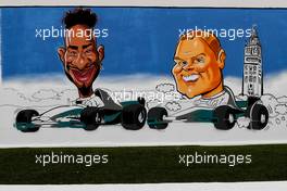 Lewis Hamilton (GBR) Mercedes AMG F1 and Valtteri Bottas (FIN) Mercedes AMG F1 caricatures in the paddock. 11.05.2018. Formula 1 World Championship, Rd 5, Spanish Grand Prix, Barcelona, Spain, Practice Day.