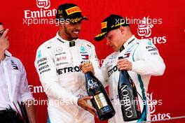(L to R): Lewis Hamilton (GBR) Mercedes AMG F1 celebrates on the podium with team mate Valtteri Bottas (FIN) Mercedes AMG F1. 13.05.2018. Formula 1 World Championship, Rd 5, Spanish Grand Prix, Barcelona, Spain, Race Day.