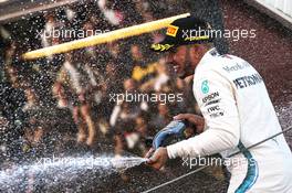 Race winner Lewis Hamilton (GBR) Mercedes AMG F1 celebrates with the champagne on the podium. 13.05.2018. Formula 1 World Championship, Rd 5, Spanish Grand Prix, Barcelona, Spain, Race Day.