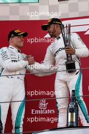 Race winner Lewis Hamilton (GBR) Mercedes AMG F1 (Right) celebrates on the podium with second placed team mate Valtteri Bottas (FIN) Mercedes AMG F1. 13.05.2018. Formula 1 World Championship, Rd 5, Spanish Grand Prix, Barcelona, Spain, Race Day.