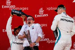 (L to R): Race winner Lewis Hamilton (GBR) Mercedes AMG F1 celebrates on the podium with Peter Bonnington (GBR) Mercedes AMG F1 Race Engineer and Valtteri Bottas (FIN) Mercedes AMG F1. 13.05.2018. Formula 1 World Championship, Rd 5, Spanish Grand Prix, Barcelona, Spain, Race Day.