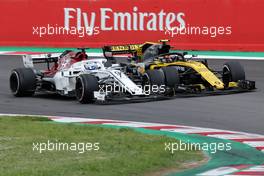 Marcus Ericsson (SWE) Sauber F1 Team and Carlos Sainz Jr (ESP) Renault F1 Team  13.05.2018. Formula 1 World Championship, Rd 5, Spanish Grand Prix, Barcelona, Spain, Race Day.