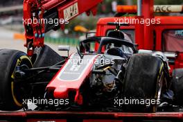 The damaged Haas VF-18 of race retiree Romain Grosjean (FRA) Haas F1 Team is recovered back to the pits on the back of a truck. 13.05.2018. Formula 1 World Championship, Rd 5, Spanish Grand Prix, Barcelona, Spain, Race Day.