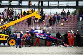 The damaged Scuderia Toro Rosso STR13 of Brendon Hartley (NZL) Scuderia Toro Rosso is removed from the circuit after he crashed in the second practice session. 12.05.2018. Formula 1 World Championship, Rd 5, Spanish Grand Prix, Barcelona, Spain, Qualifying Day.