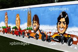 Fernando Alonso (ESP) McLaren and Carlos Sainz Jr (ESP) Renault Sport F1 Team - caricatures in the paddock. 12.05.2018. Formula 1 World Championship, Rd 5, Spanish Grand Prix, Barcelona, Spain, Qualifying Day.