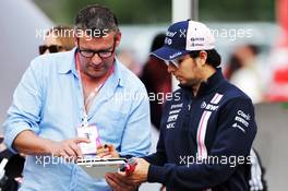 Sergio Perez (MEX) Sahara Force India F1 signs autographs for the fans. 12.05.2018. Formula 1 World Championship, Rd 5, Spanish Grand Prix, Barcelona, Spain, Qualifying Day.