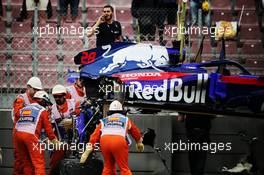The damaged Scuderia Toro Rosso STR13 of Brendon Hartley (NZL) Scuderia Toro Rosso is removed from the circuit after he crashed in the second practice session. 12.05.2018. Formula 1 World Championship, Rd 5, Spanish Grand Prix, Barcelona, Spain, Qualifying Day.