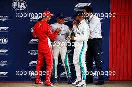 (L to R): Sebastian Vettel (GER) Ferrari in qualifying parc ferme with Valtteri Bottas (FIN) Mercedes AMG F1 and Lewis Hamilton (GBR) Mercedes AMG F1. 12.05.2018. Formula 1 World Championship, Rd 5, Spanish Grand Prix, Barcelona, Spain, Qualifying Day.