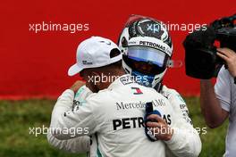 Lewis Hamilton (GBR) Mercedes AMG F1 celebrates his pole position in qualifying parc ferme with second placed team mate Valtteri Bottas (FIN) Mercedes AMG F1. 12.05.2018. Formula 1 World Championship, Rd 5, Spanish Grand Prix, Barcelona, Spain, Qualifying Day.