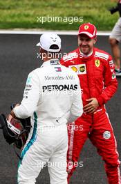 (L to R): Lewis Hamilton (GBR) Mercedes AMG F1 with Sebastian Vettel (GER) Ferrari in qualifying parc ferme. 12.05.2018. Formula 1 World Championship, Rd 5, Spanish Grand Prix, Barcelona, Spain, Qualifying Day.