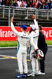 (L to R): Valtteri Bottas (FIN) Mercedes AMG F1 celebrates his second position in qualifying parc ferme with team mate and pole sitter Lewis Hamilton (GBR) Mercedes AMG F1, who is interviewed by Davide Valsecchi (ITA) Sky F1 Italia Presenter. 12.05.2018. Formula 1 World Championship, Rd 5, Spanish Grand Prix, Barcelona, Spain, Qualifying Day.