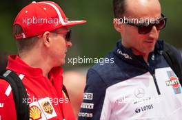 (L to R): Kimi Raikkonen (FIN) Ferrari with Robert Kubica (POL) Williams Reserve and Development Driver. 10.05.2018. Formula 1 World Championship, Rd 5, Spanish Grand Prix, Barcelona, Spain, Preparation Day.