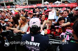 Sergio Perez (MEX) Sahara Force India F1 signs autographs for the fans in the F1 Fanzone. 10.05.2018. Formula 1 World Championship, Rd 5, Spanish Grand Prix, Barcelona, Spain, Preparation Day.