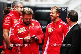 Gino Rosato (CDN) Ferrari (Centre) with Maurizio Arrivabene (ITA) Ferrari Team Principal (Left) and Sebastian Vettel (GER) Ferrari (Right). 10.05.2018. Formula 1 World Championship, Rd 5, Spanish Grand Prix, Barcelona, Spain, Preparation Day.