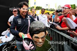 Sergio Perez (MEX) Sahara Force India F1 behind the Sergio Perez mask. 10.05.2018. Formula 1 World Championship, Rd 5, Spanish Grand Prix, Barcelona, Spain, Preparation Day.