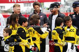 Lewis Hamilton (GBR) Mercedes AMG F1 with karting kids. 10.05.2018. Formula 1 World Championship, Rd 5, Spanish Grand Prix, Barcelona, Spain, Preparation Day.