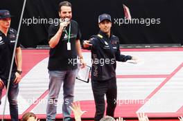 (L to R): Max Verstappen (NLD) Red Bull Racing and Daniel Ricciardo (AUS) Red Bull Racing with fans in the F1 Fanzone. 10.05.2018. Formula 1 World Championship, Rd 5, Spanish Grand Prix, Barcelona, Spain, Preparation Day.