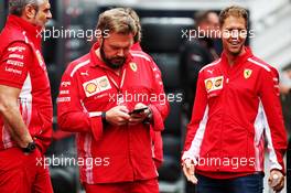 Gino Rosato (CDN) Ferrari (Centre) with Maurizio Arrivabene (ITA) Ferrari Team Principal (Left) and Sebastian Vettel (GER) Ferrari (Right). 10.05.2018. Formula 1 World Championship, Rd 5, Spanish Grand Prix, Barcelona, Spain, Preparation Day.
