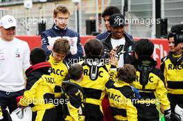 Lewis Hamilton (GBR) Mercedes AMG F1 with karting kids. 10.05.2018. Formula 1 World Championship, Rd 5, Spanish Grand Prix, Barcelona, Spain, Preparation Day.
