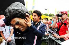 Sergio Perez (MEX) Sahara Force India F1 behind the Sergio Perez mask. 10.05.2018. Formula 1 World Championship, Rd 5, Spanish Grand Prix, Barcelona, Spain, Preparation Day.