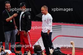 (L to R): Lewis Hamilton (GBR) Mercedes AMG F1 and team mate with fans in the F1 Fanzone. 10.05.2018. Formula 1 World Championship, Rd 5, Spanish Grand Prix, Barcelona, Spain, Preparation Day.