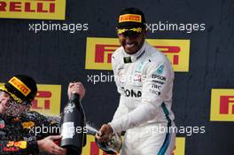 Race winner Lewis Hamilton (GBR) Mercedes AMG F1 celebrates on the podium with Max Verstappen (NLD) Red Bull Racing. 24.06.2018. Formula 1 World Championship, Rd 8, French Grand Prix, Paul Ricard, France, Race Day.