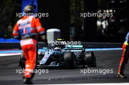Valtteri Bottas (FIN) Mercedes AMG F1 W09 with a puncture at the start of the race. 24.06.2018. Formula 1 World Championship, Rd 8, French Grand Prix, Paul Ricard, France, Race Day.