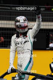 Lewis Hamilton (GBR) Mercedes AMG F1 W09 celebrates his pole position in qualifying parc ferme. 23.06.2018. Formula 1 World Championship, Rd 8, French Grand Prix, Paul Ricard, France, Qualifying Day.
