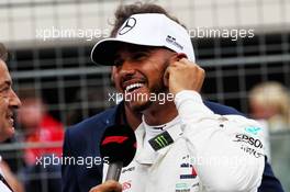 Lewis Hamilton (GBR) Mercedes AMG F1 in qualifying parc ferme with Jean Alesi (FRA). 23.06.2018. Formula 1 World Championship, Rd 8, French Grand Prix, Paul Ricard, France, Qualifying Day.