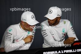 (L to R): Valtteri Bottas (FIN) Mercedes AMG F1 and team mate Lewis Hamilton (GBR) Mercedes AMG F1 in the post qualifying FIA Press Conference. 23.06.2018. Formula 1 World Championship, Rd 8, French Grand Prix, Paul Ricard, France, Qualifying Day.