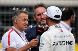 Lewis Hamilton (GBR) Mercedes AMG F1 in qualifying parc ferme with Jean Alesi (FRA) and Frank Montangy (FRA) Canal+ TV Presenter. 23.06.2018. Formula 1 World Championship, Rd 8, French Grand Prix, Paul Ricard, France, Qualifying Day.