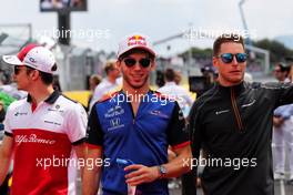 (L to R): Charles Leclerc (MON) Sauber F1 Team, Pierre Gasly (FRA) Scuderia Toro Rosso, and Stoffel Vandoorne (BEL) McLaren, on the drivers parade. 24.06.2018. Formula 1 World Championship, Rd 8, French Grand Prix, Paul Ricard, France, Race Day.