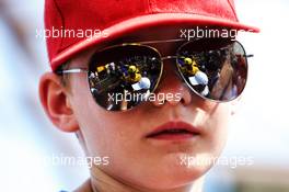 Carlos Sainz Jr (ESP) Renault Sport F1 Team reflected in a young fan's sunglasses. 21.06.2018. Formula 1 World Championship, Rd 8, French Grand Prix, Paul Ricard, France, Preparation Day.