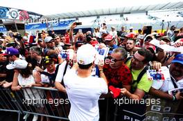 Pierre Gasly (FRA) Scuderia Toro Rosso signs autographs for the fans. 21.06.2018. Formula 1 World Championship, Rd 8, French Grand Prix, Paul Ricard, France, Preparation Day.