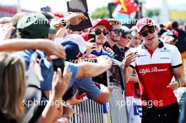 Charles Leclerc (MON) Sauber F1 Team with fans. 21.06.2018. Formula 1 World Championship, Rd 8, French Grand Prix, Paul Ricard, France, Preparation Day.