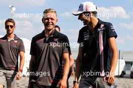 (L to R): Kevin Magnussen (DEN) Haas F1 Team with Esteban Ocon (FRA) Sahara Force India F1 Team. 06.07.2018. Formula 1 World Championship, Rd 10, British Grand Prix, Silverstone, England, Practice Day.