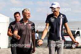 (L to R): Kevin Magnussen (DEN) Haas F1 Team with Esteban Ocon (FRA) Sahara Force India F1 Team. 06.07.2018. Formula 1 World Championship, Rd 10, British Grand Prix, Silverstone, England, Practice Day.