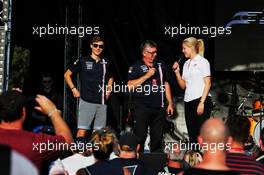 (L to R): George Russell (GBR) Sahara Force India F1 Test Driver with Otmar Szafnauer (USA) Sahara Force India F1 Chief Operating Officer and Rosanna Tennant (GBR) F1 Presenter on stage at the Sahara Force India F1 Team Fan Zone. 06.07.2018. Formula 1 World Championship, Rd 10, British Grand Prix, Silverstone, England, Practice Day.