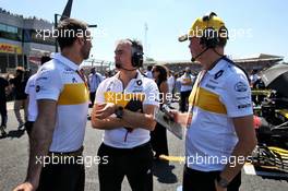 (L to R): Cyril Abiteboul (FRA) Renault Sport F1 Managing Director with Nick Chester (GBR) Renault Sport F1 Team Chassis Technical Director and Alan Permane (GBR) Renault Sport F1 Team Trackside Operations Director on the grid. 08.07.2018. Formula 1 World Championship, Rd 10, British Grand Prix, Silverstone, England, Race Day.