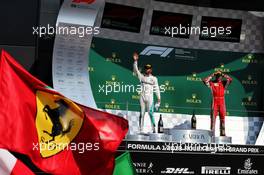 (L to R): Lewis Hamilton (GBR) Mercedes AMG F1 and Kimi Raikkonen (FIN) Ferrari on the podium. 08.07.2018. Formula 1 World Championship, Rd 10, British Grand Prix, Silverstone, England, Race Day.
