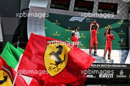 The podium (L to R): Lewis Hamilton (GBR) Mercedes AMG F1, second; Sebastian Vettel (GER) Ferrari, race winner; Kimi Raikkonen (FIN) Ferrari, third. 08.07.2018. Formula 1 World Championship, Rd 10, British Grand Prix, Silverstone, England, Race Day.