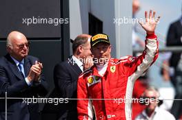 Kimi Raikkonen (FIN) Ferrari celebrates his third position on the podium. 08.07.2018. Formula 1 World Championship, Rd 10, British Grand Prix, Silverstone, England, Race Day.