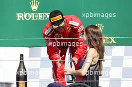 Kimi Raikkonen (FIN) Ferrari celebrates his third position on the podium. 08.07.2018. Formula 1 World Championship, Rd 10, British Grand Prix, Silverstone, England, Race Day.