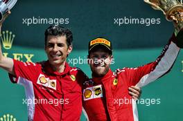 (L to R): Claudio Albertini (ITA) Ferrari celebrates on the podium with race winner Sebastian Vettel (GER) Ferrari. 08.07.2018. Formula 1 World Championship, Rd 10, British Grand Prix, Silverstone, England, Race Day.